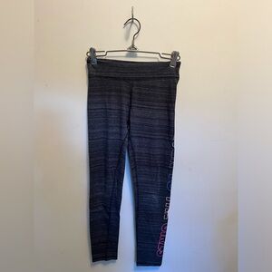 SO, girls youth grey leggings with wording down the side of left leg.